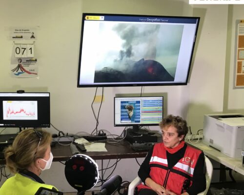 This interview with Maria José Blanco (Head of IGN Spain in the Canary Islands) towards the end of November was fascinating. The interview took place in IGN’s commandeered headquarters in the basement of a church in El Paso with a good view towards the volcano. The place was awash with screens, field equipment, wires and boxes. Behind Maria José was live feeds from the cameras set up around the volcanic cone and the seismometers close to the volcano. The day of the interview was one of a few days during the eruption with a very high number of earthquakes, and during the interview you could feel an earthquake through your feet and then see the signal simultaneously come through on the seismograph on the screen.